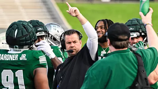 Kasey Teegardin coaches up the defensive line in 2025