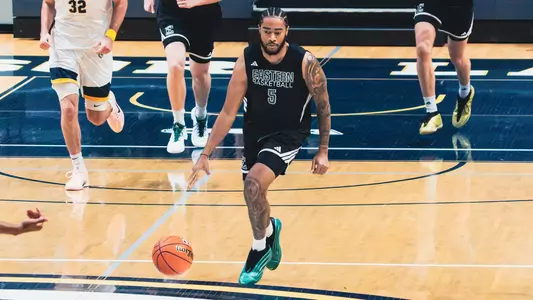 Braelon Green shortly after dribbling a basketball with his right hand at University of Windsor, Aug. 15, 2026