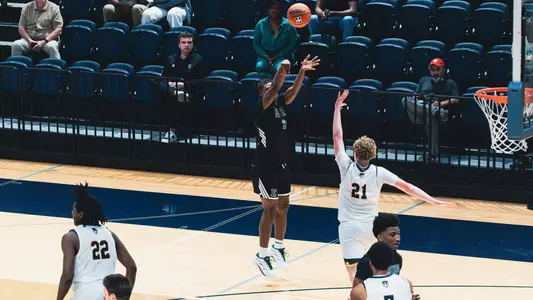 Emanuel Richards shortly after shooting a basketball toward the basketball hoop at University of Windsor, Aug. 15, 2026