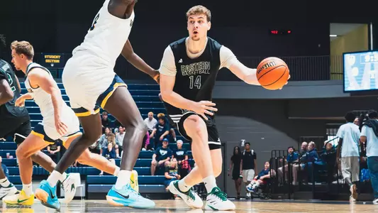 Kilian Brockhoff looking toward a basketball hoop while preparing to throw a bounce pass with his left hand at University of Windsor, Aug. 15, 2026