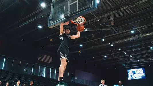 Mohammad Habhab shortly after placing a basketball through a basketball hoop at University of Windsor, Aug. 15, 2026
