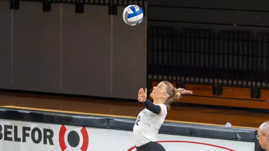 Olivia Beaudrie serves the ball at Oakland University