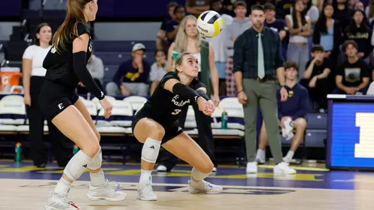 Nattie Slusher digging a volleyball at Michigan, Sept. 17, 2026