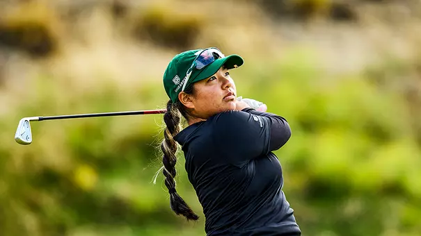 Karen Tsuru watches her shot land on the green at the Leadership & Golf Invitational