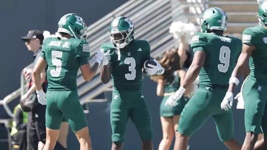 Benson Prosper (3) celebrates his firs career touchdown catch in the end zone with Harold Mack, Jr. (5), in the game against Lindenwood