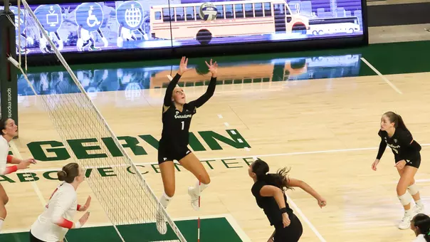 Lina Govoni sets the volleyball at home against Illinois State, Sept. 6, 2026