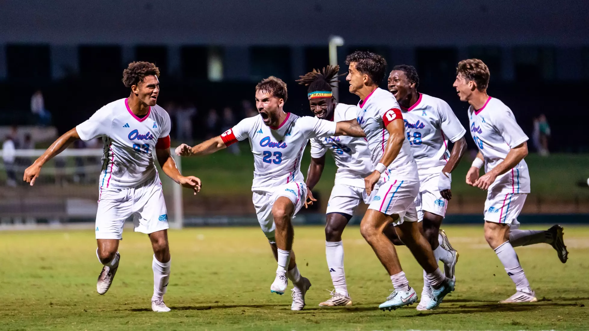 FAU MSOC celebrates goal versus USF.