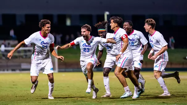 FAU MSOC celebrates goal versus USF.
