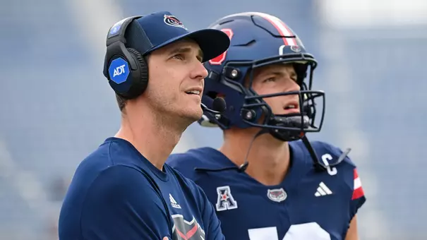 Head Coach Zach Kittley and QB Caden Veltkamp