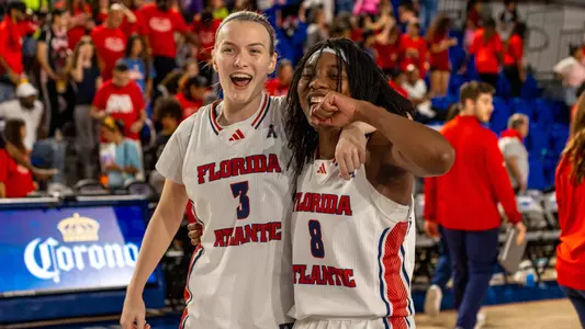 Kristina Godfrey and Stefanie Ingram after win vs. Rice