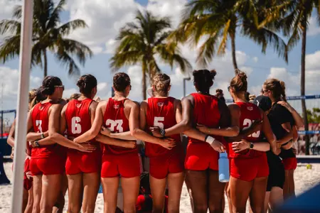 Beach Volleyball Huddle vs. FGCU