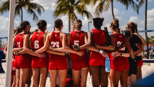 Beach Volleyball Huddle vs. FGCU