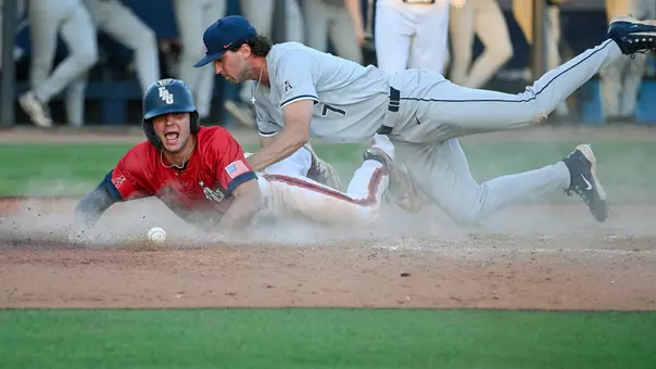 Brett Patten slides into home