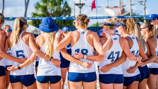 2026 Beach Volleyball Team Huddle