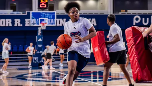 Janiah Suprius driving in for a layup during practice on June 15