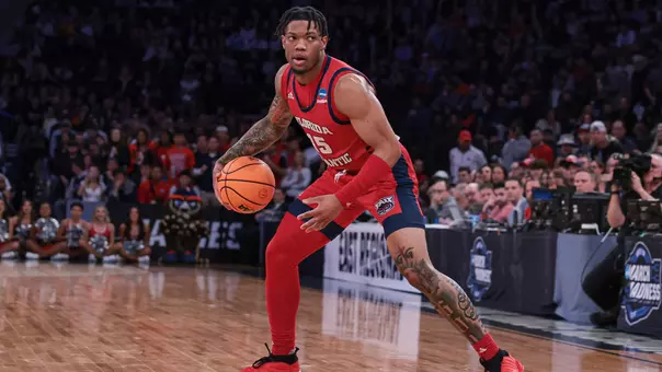 Alijah Martin dribbling at the Elite Eight against Kansas State at Madison Square Garden