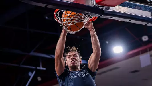 Matthew "Matas" Puodziukaitis dunking during practice