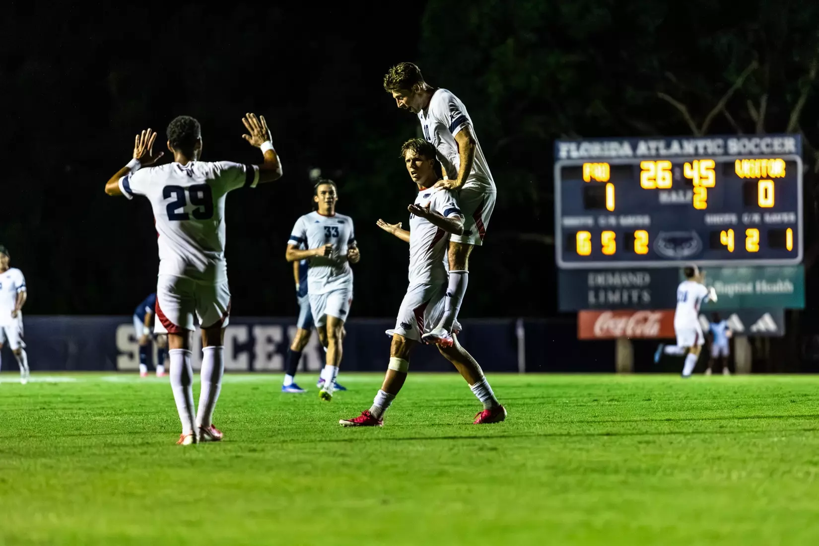 Men's soccer's Jonas Sundli-Hardig celebrating his goal with teammates after scoring a goal versus UNF.