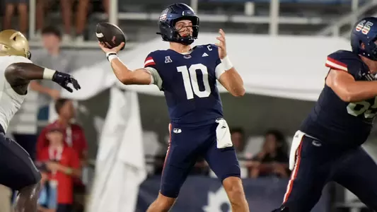 Caden Veltkamp dropping back to pass in the 38-30 victory over RV Navy