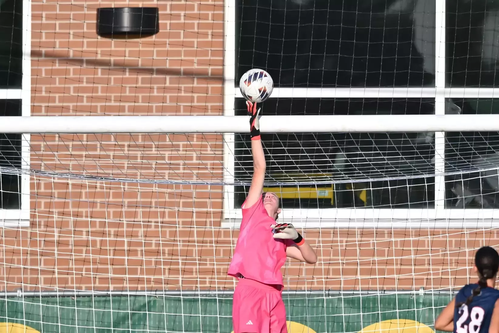 Women's soccer's Lily Holden saving an attempted shot by North Dakota State during their 1-1 against the Bison.