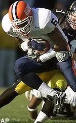 Illinois receiver Brandon<br>Lloyd is tackled by<br>Iowa's Matt Stockdale<br>after making a<br>reception in the<br>first half Saturday.