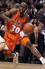 Guard Frank Williams drives to the basket in the first half of the 84-70 Illini victory over No. 8 Kansas Saturday.