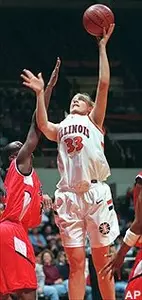 Illinois' Susan Blauser shoots between Cal State Northridge defenders Tuesday in Champaign, Ill.