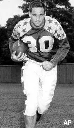 University of Illinois football player Stan Wallace is shown in Chicago, in this August 8, 1954 photo. Wallace, who helped Illinois to victory in the 1952 Rose Bowl and went on to play for the Chicago Bears, died Monday Dec. 6, 1999 following heart surgery in Urbana, Ill.. He was 68.