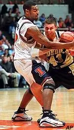 Cleotis Brown collides with Purdue's Carson Cunningham during Wednesday's game.