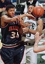 Illini's Brian Cook looks to pass to Frank Williams who hit a three pointer and three free throws.
