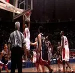 Brian Cook slams it home in second half action Friday night vs. NBC Thunder. Illinois opens the regular season next Friday night when Maine comes to the Assembly Hall.
