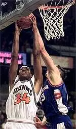 Illinois' Brian Cook goes up for a shot during the Illini's 93-76 loss to Florida, Sunday.