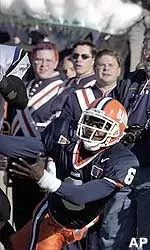 Northwestern cornerback Marvin Ward tries for but is unable to hang on to a pass intended for Illinois' Brandon Lloyd in the first half Thursday.