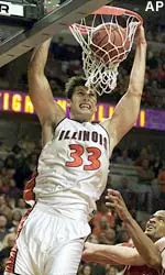 Illinois forward Damir Krupalija dunks the go-ahead basket in the final seconds against Arkansas, Saturday.