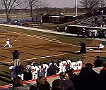 Benefactor Shorty Eichelberger delivers the ceremonial first pitch prior to Illinois' first-ever home intercollegiate women's softball game. The Illini were hosting Valparaiso at Eichelberger Field Tuesday afternoon.