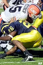 Kurt Kittner runs in for a three-yard touchdown in Illinois' loss to Michigan Saturday.