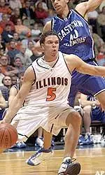 Illiinois' Deron Williams drives past Eastern Illinois' John Thorsen in the first half.