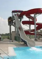 The Illini football team cooled off at local water park after practicing twice in 90-degree heat at Camp Rantoul Thursday.