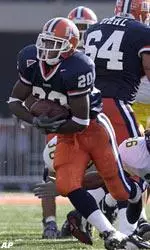 Illinois running back Virgil Morris rambles for extra yards against Michigan.