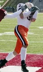 Eric McGoey hauls in a second-quarter touchdown pass Saturday.
