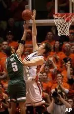 Illinois' Nick Smith blocks Michigan State's Chris Hill's shot in the second half of Illinois' 70-40 win over the Spartans.