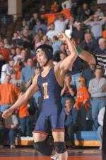 Senior Twan Pham's upset over Michigan State's fifth-ranked Nick Simmons help the eighth-ranked Illini to a 17-16 victory over the Spartans.