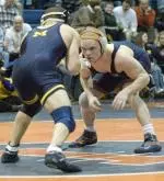 Sophomore Mark Jayne won his match by fall over Northwestern's Jon Ott during Friday's dual.