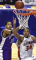 Brian Cook goes up for two of his 20 points against Northwestern, Friday.