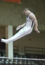 Adam Pummer posted a career high score of 54.575 to win the all-around title vs. No. 1 Oklahoma Saturday night at Huff Hall