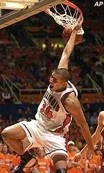 Brian Cook slams in two of his 22 points against Minnesota, Sunday.
