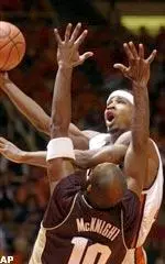 Dee Brown goes up over a Purdue defender for two of his 14 points.