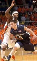 Dee Brown guards Penn State's Ben Luber during the first half.