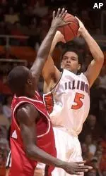 Deron Williams puts a shot up over Illinois State's Vince Greene during the first half.