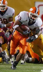 Illinois running back Marcus Mason gains 15 yards on a second-quarter run.
